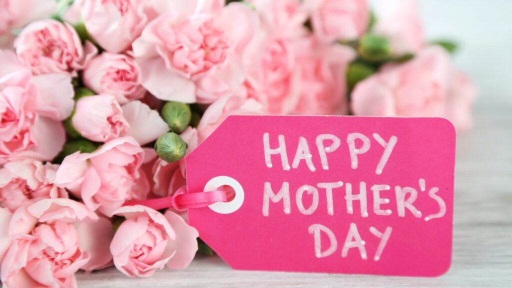 flowers with a gift tag that reads "Happy Mother's Day"